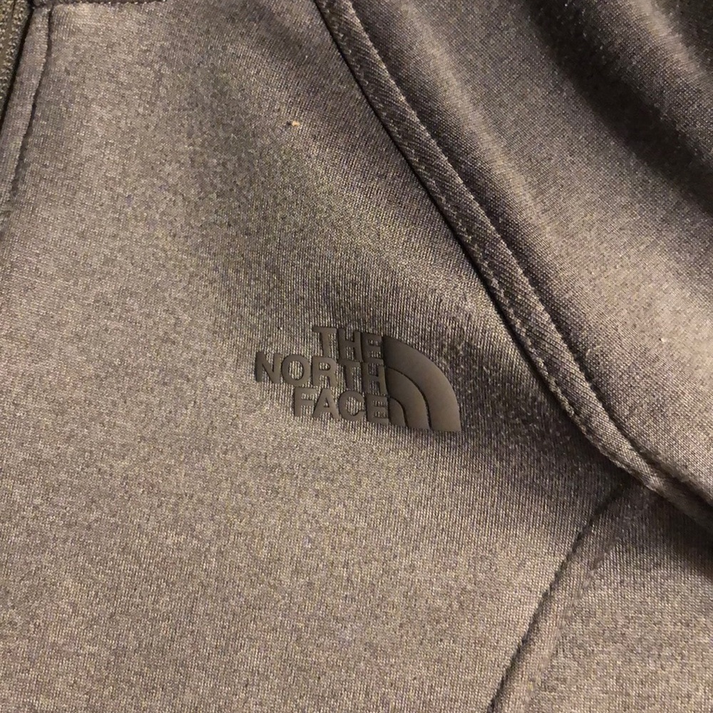 gray north face jacket